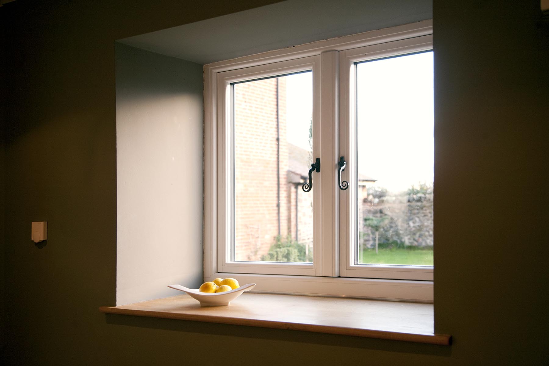 R9 white flush sash window with monkey tailed handle